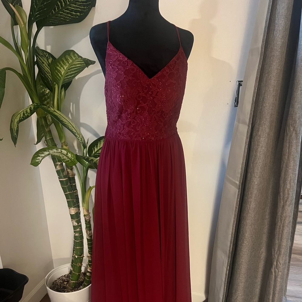 Beautiful dress from David’s bridal size 12 maroon color lace top